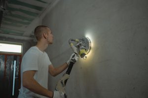 Poncer du béton